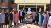দুমকিতে বঙ্গবন্ধুকে শ্রদ্ধা জানাতে জুতা পায়ে প্রতিকৃতিতে